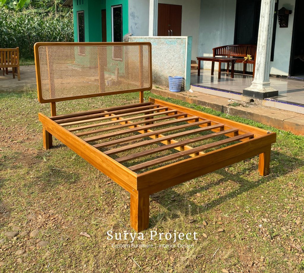 Handcrafted teak bed with rattan headboard, durable and eco-friendly furniture design
